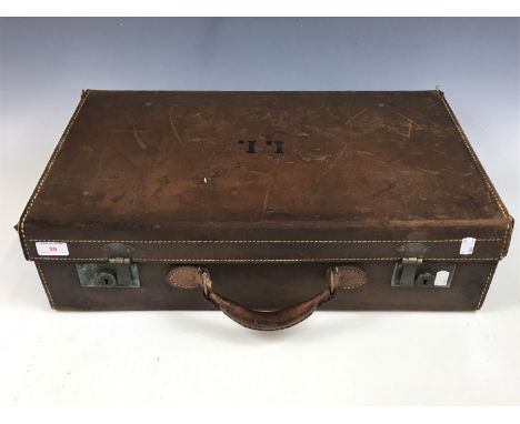 A vintage hide suitcase