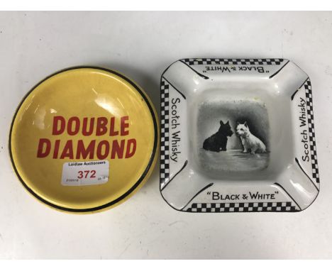 A Double Diamond pub dish together with a black and white Scotch Whiskey ashtray
