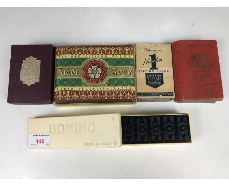 A Lexicon card game together with a USSR domino set and sundry playing cards etc