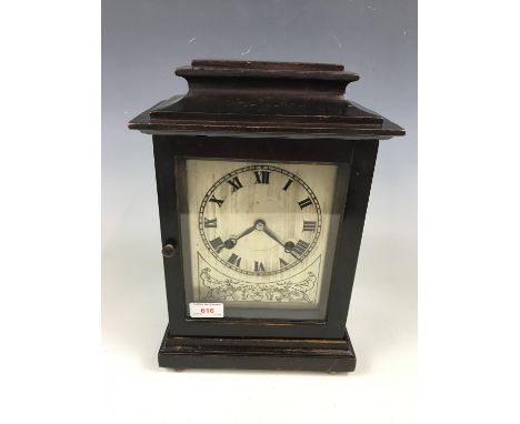 A mahogany cased mantel clock