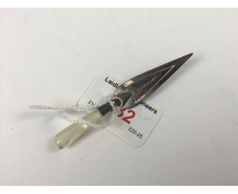 A novelty silver bookmark in the form of a trowel 