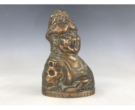 A vintage reproduction novelty money bank modelled as a policeman 