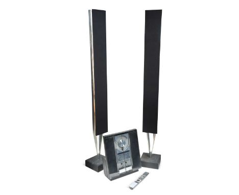Bang and Olufsen, a Beosound Ouverture stereo system,  together with a pair of Beolab 8000 floor standing speakers and a BE04