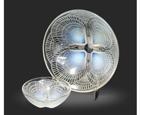 Coquille, an R. Lalique opalescent glass dish, pattern 3202, relief moulded with four shells, wheel-etched mark to underside,