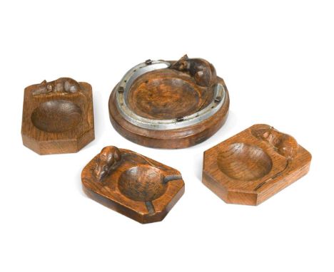 Robert 'Mouseman' Thompson, a group of four oak ashtrays, three of rectangular forms with two canted corners, the other of ci