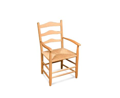 Neville Neal, a Cotswold School ash child's chair,  the ladder back design with rush seat64cm high