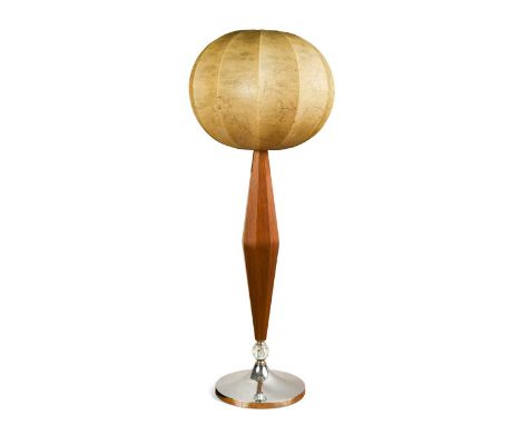 A mid-century floor lamp with parchment shade.  with bulbous octagonal column to a spreading chrome base78.5cm high excluding