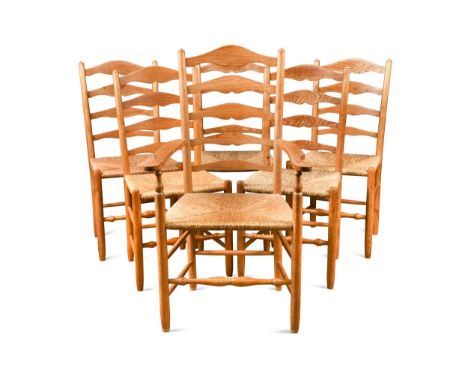 Edward Gardiner after Ernest Gimson (1864-1912), a set of six ash ladder back chairs,  each with rush seat, five stamped 'Ed 
