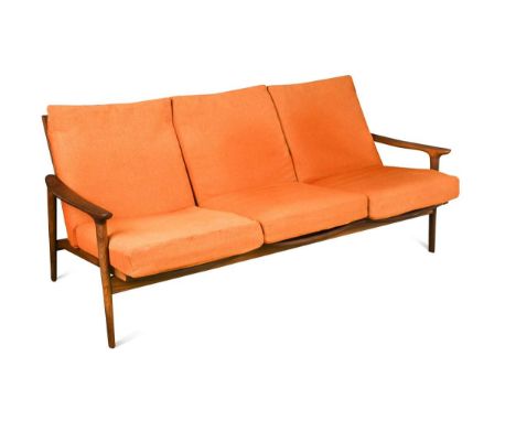 George Fejer and Eric Phamphilon for Guy Rogers, a New Yorker teak sofa, circa 1960, with original orange fabric loose cushio