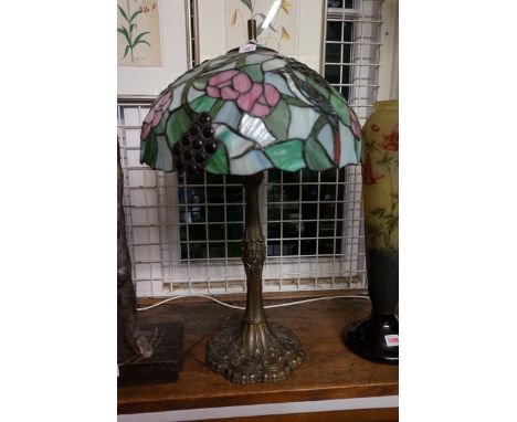 A Tiffany style table lamp,&nbsp;with stained glass shade, 65cm high. 