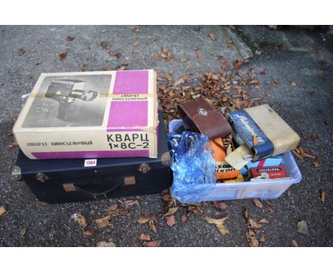 A Pathescope Gem projector;&nbsp;together with a boxed cine camera and other vintage camera equipment. 