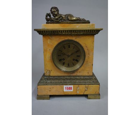 (LC) A late 19th century Sienna marble and gilt metal mantel clock,&nbsp;striking on a bell, 31.5cm high, with pendulum. 