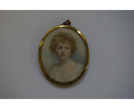 English School,&nbsp;a late 19th/early 20th century, head and shoulders portrait of an attractive young lady, probably on ivo