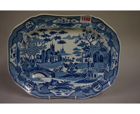 A small 19th century Spode 'Gothic Castle' pattern blue and white meat plate,&nbsp;32cm wide. 