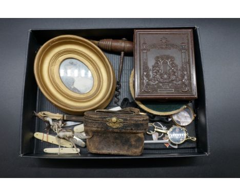 A small group of works of art, to include: a cased pair of mother-of-pearl opera glasses; two pairs of gilt metal lorgnettes;