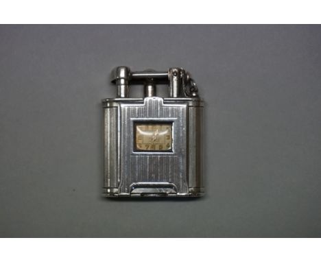 A rare 1920s Alfred Dunhill silver novelty timepiece lighter,&nbsp;French import marks, Serial No: 2325, Pat No. 143752, 5.5c