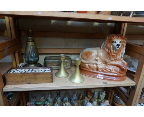 A mixed lot, comprising: a Staffordshire pottery lion; a ship in glass bottle; a Chinese cloisonne enamel table lamp; a pair 