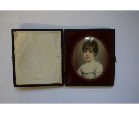 English School, early 19th century, portrait miniature of a young girl, on ivory, 6.8 x 5.4cm oval, in a leather case.&nbsp;&