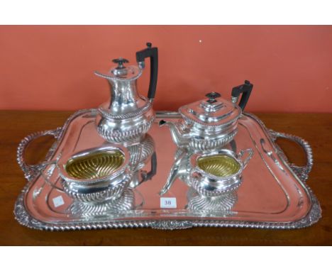 A silver plated four piece tea and coffee service and a serving tray