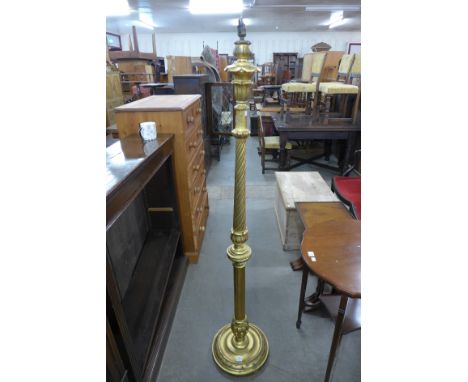 A gilt standard lamp