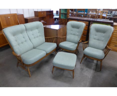 An Ercol four piece lounge suite, circa 1993