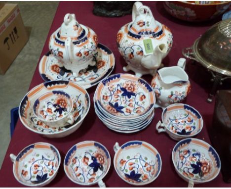 A 'Gaudy Welsh' or cottage lustre part tea service of 19 pieces