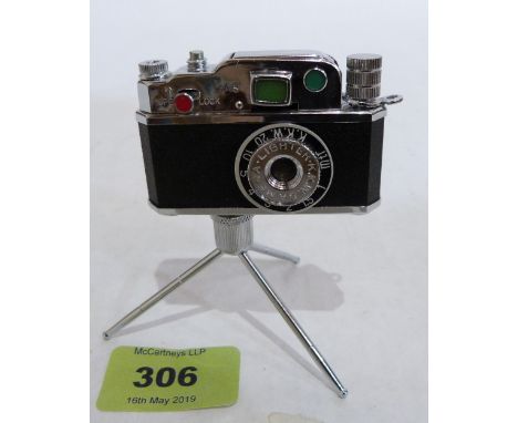 A Japanese novelty camera lighter on tripod stand. Probably 1950s