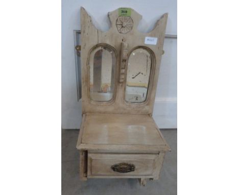 A painted wall bracket with drawer and two mirror plates. 24' high