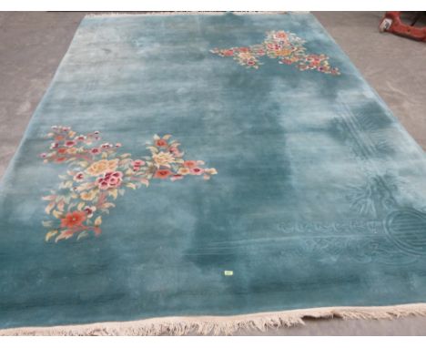 A Chinese blue ground carpet. 12'7' x 9'