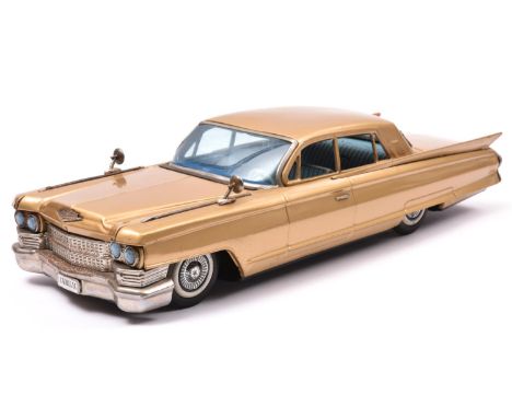 An Impressively Large Japanese Bandai Tinplate Friction Powered 1961-62 Cadillac 4 door Sedan. Finished in metallic gold. Pla