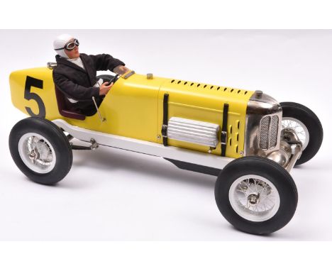 A tinplate and die-cast 'Miller' single seat racing Car. Designed in the U.K. by Gilbow, this impressively large model has an
