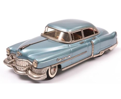 An impressive GAMA Tinplate 1950's American Saloon. A friction powered example with steering, finished in light metallic blue