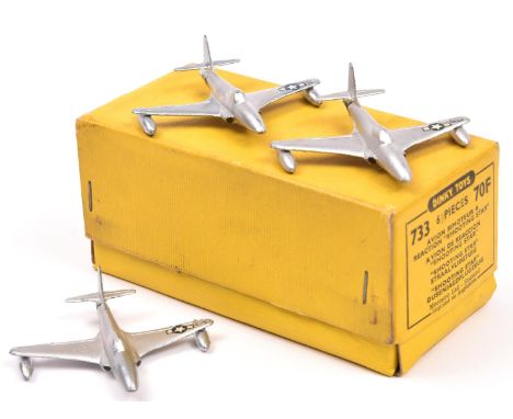 A Trade Pack of Dinky Toys Shooting Star Jet Fighters. (733-70F). A complete set of 6 in silver with U.S. Star markings Boxed