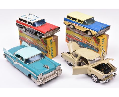 2 Japanese push along tinplate American Ford Fairlane Station Wagons. One in cream and mid blue with red/white flash and the 