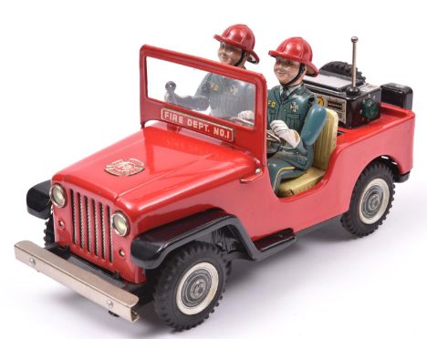 A Japanese T.N. (Nomura) Tinplate Battery Powered 'Fire Dept. No.1' Jeep. A mystery action toy, finished in red with black fr