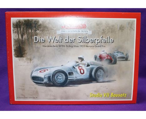 A Schuco Studio VII Bausatz - Mercedes-Benz W196 Stirling Moss 1953 Monaco Grand Prix. An as new unmade factory silver painte