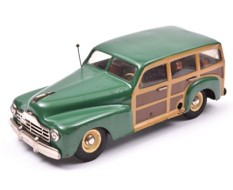 An MLB (Italian) Produced Heavy Tinplate late 1940's Style Plymouth 'Woody' Station Wagon. A clockwork example In dark leaf g