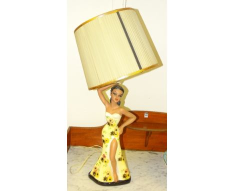 A 1950's lady lamp with shade by Duron, registered no.901605, 51cm high, fitted for electricity