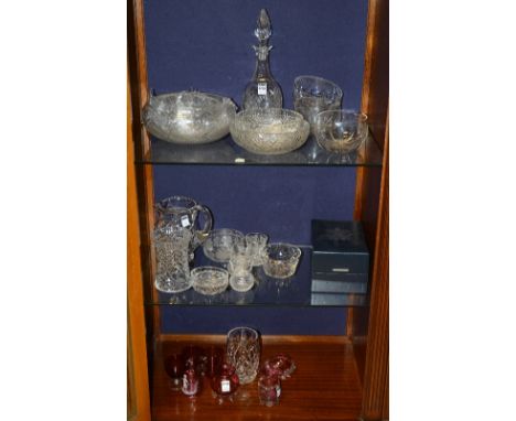 A collection of crystal and cranberry glass, to include bowls, decanter, jugs, glasses etc (a lot)