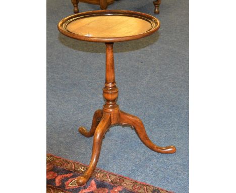 A Victorian style tea table, the circular top raised on turned column and tripod supports, 64cm high x 44cm wide