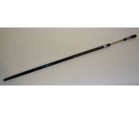 An Indian ebonised and bone sword stick, with gilt metal pommel and mount, blade 57cm long