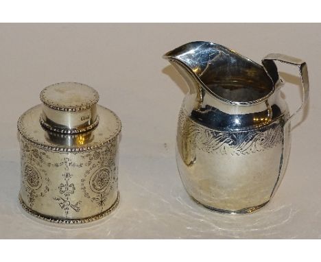 A small silver caddy jar with lid, hallmarks for Chester 1913, with bow and swag etched decoration and plain cartouche to cen