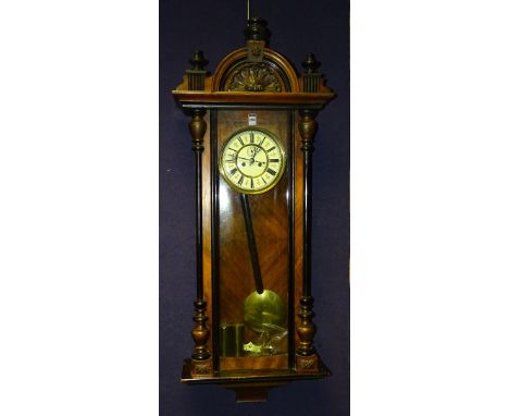 A mahogany cased Continental twin train Vienna wall clock circa early 20th century, the 6.5 inch cream enamel dial with subsi