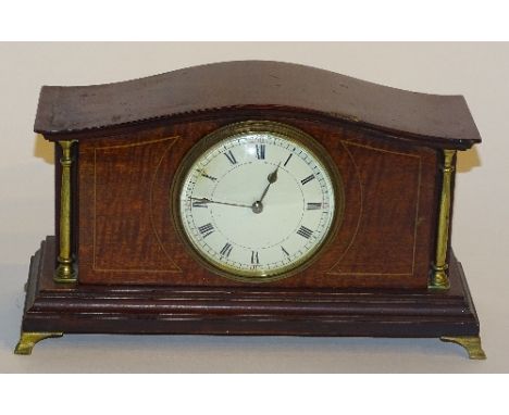 An Edwardian mahogany mantel clock, the white enamel dial with Roman numerals, 15cm high