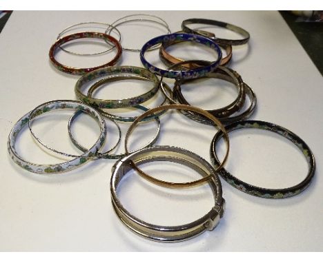 A collection of bangles, to include silver, enamel, mother of pearl etc (21)