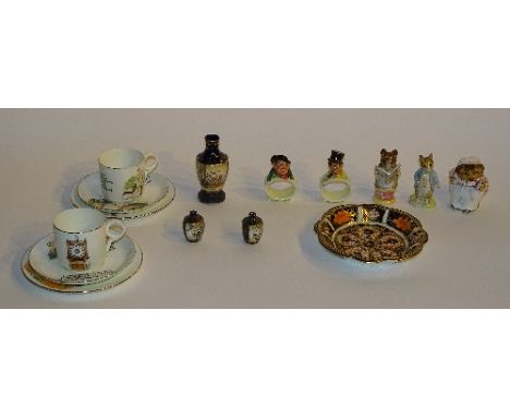 A group of Royal Doulton and Beswick ceramics, to include Tony Weller & Sam Weller napkin rings, Beatrix Potter, Mrs Tiggy Wi