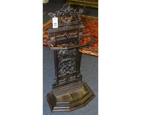 A Victorian cast iron stick stand, possibly by Carron Works Falkirk, decorated with peacock above thistles, drip tray to base