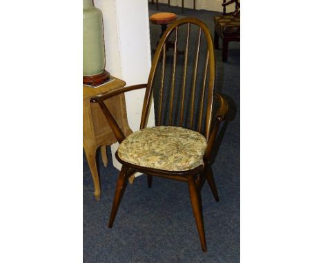 An Ercol carver armchair, with spindle back, stamped to underside, 96cm high