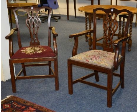 A pair of matching mahogany carver armchairs, in the style of Jas Schoolbred, with pierced splat above tapestry seat, raised 