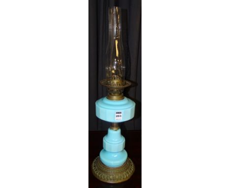 A late Victorian blue opaque glass oil lamp, with glass funnel, 60cm high